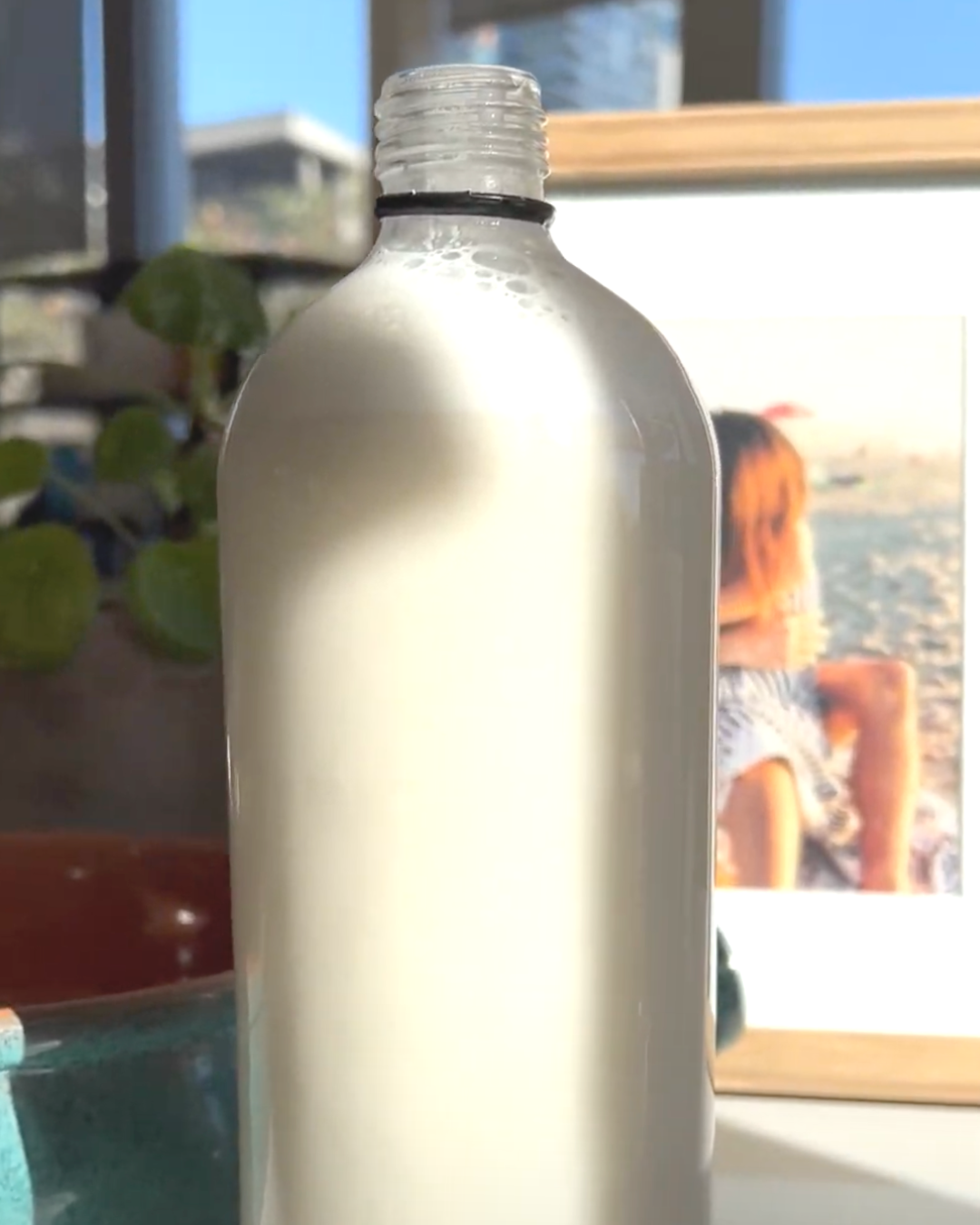 Glass bottle full of milk